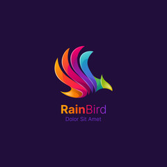 Flying bird with rainbow wings gradient logo