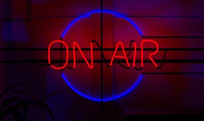 Obraz premium Red Neon On Air Sign in the Dark