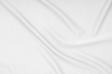 Fototapeta na wymiar Abstract soft waves of white silk fabric, satin, cloth surface, white fabric texture background.