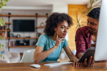 Fototapeta premium Adult woman, being mentored by her senior partner.