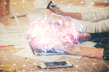 Multi exposure of woman hands working on computer and brain hologram drawing. Ai concept.