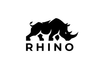 Rhino logo template. Endangered African Rhinoceros silhouette icon. Horned animal symbol. Wild beast company strength sign. Vector illustration. © JoelMasson