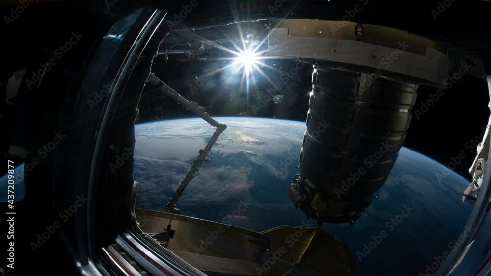 Wall mural flight over the earth's surface, made from a space station. 3d rendering