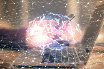 Double exposure of man's hand holding and using a digital device and brain hologram drawing. Data...
