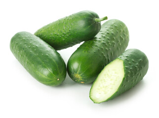 heap of green cucumbers isolated on white background