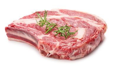 big raw rib-eye steak with rosemary twig isolated on white background