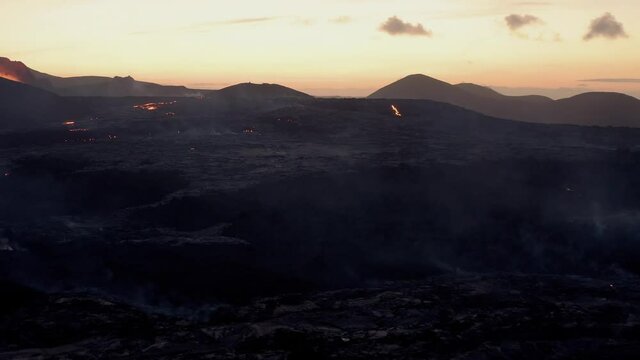 Volcano in Iceland - Long continues shot through lava field and smoke