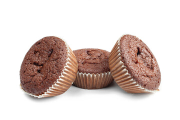 Three chocolate muffin cupcakes isolated on white background