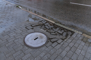 Repair of failed paving slabs. Sagging paving slabs