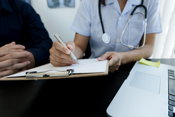 Doctor and patient are discussing consultation about symptom problem diagnosis of disease talk to the patient about medication and treatment method.