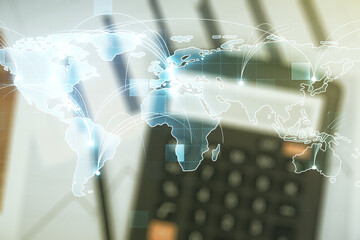 Abstract graphic digital world map hologram with connections on blurry calculator and papers...
