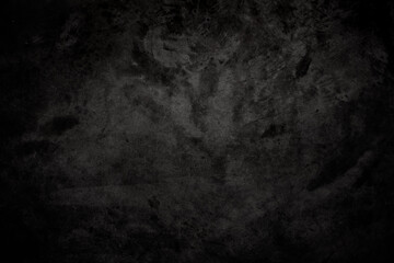 Black polished concrete wall texture background. Rough concrete grunge surface.