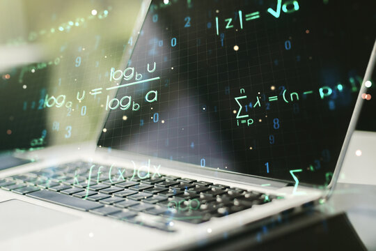 Creative scientific formula hologram on modern laptop background, research concept. Multiexposure