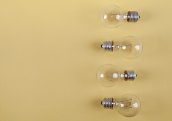 Light bulbs isolated on a yellow background.