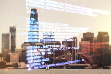 Double exposure of abstract programming language interface on San Francisco city skyscrapers background, research and development concept