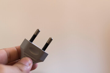 A plug for plugging in to use household electrical devices.