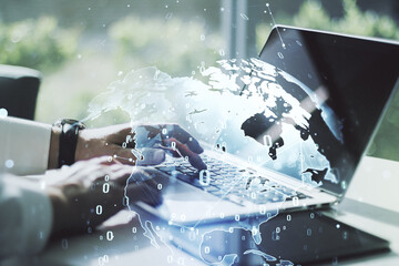 Multi exposure of abstract programming language hologram with world map and hands typing on computer keyboard on background, artificial intelligence and neural networks concept