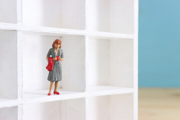 concept image of female figure metaphor standing alone