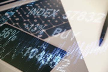 Multi exposure of abstract financial graph on laptop background, financial and trading concept