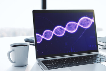 Modern computer monitor with creative DNA hologram. Bio Engineering and DNA Research concept. 3D...