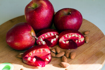 scary toothy jaws for Halloween decoration made of apples and nuts