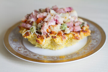 potato basket with ham, vegetables and cheese