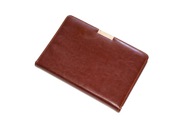 Brown notebook on white background.