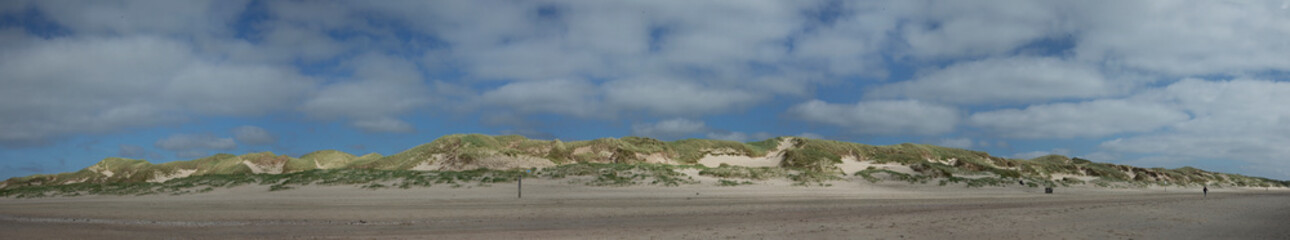Dunes and beach at Northsea coast Julianadorp Netherlands. Panorama.