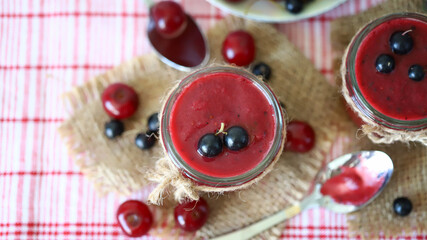 Fototapeta na wymiar Fresh summer berry smoothie. A healthy drink. Detox food.
