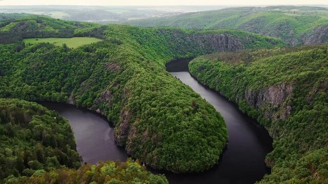 Aerial top view of natural canyon Vltava river like a horseshoe shape from Maj viewpoint.