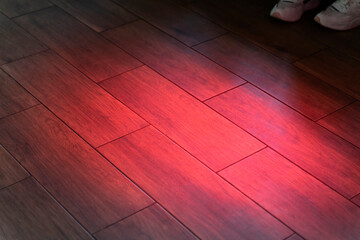 parquet dance floor refreshed with colored lights