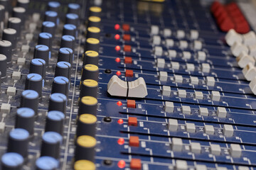 Analog mixing console close up.