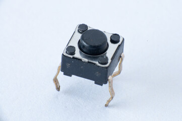 Marco of Tactile button switch isolated on white background.
