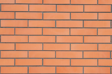 New red cladding brick masonry, mid-shot. Background image.