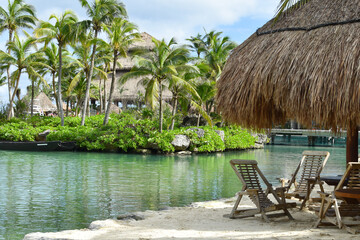 Obraz na płótnie Canvas hammocks on the beach. a place of relaxation in the tropics.