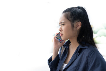 closeup Asian woman talk on the phone