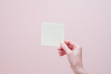 hand holding a card