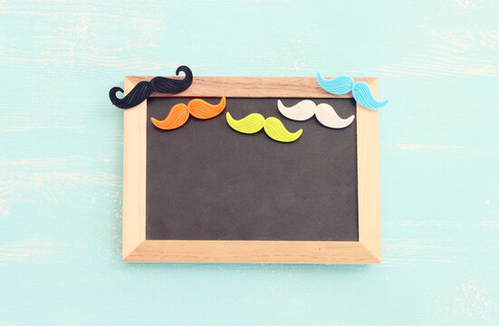 top view image of blackboard with moustache