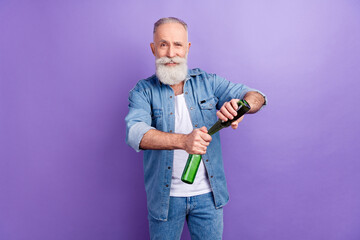 Photo of aged man happy positive smile open beer party drink weekend isolated over purple color background