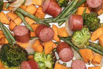 Kielbasa and sweet potato bake with broccoli grrenbeans and onions