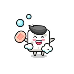 sugar cube character is bathing while holding soap