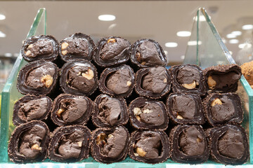 chocolate turkish delights sweets baklava lokum on market in Istanbul, Turkey. Top view blur...