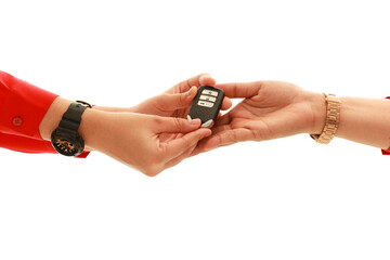 Clipping path women hand with red shirt giving modern key of car to women hand on white background. transportations concept. Sell or buy concept.