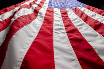 Flag of the USA isolated over dark black background. Memorial Day, Labour Day, Independence Day public holidays. Bottom view