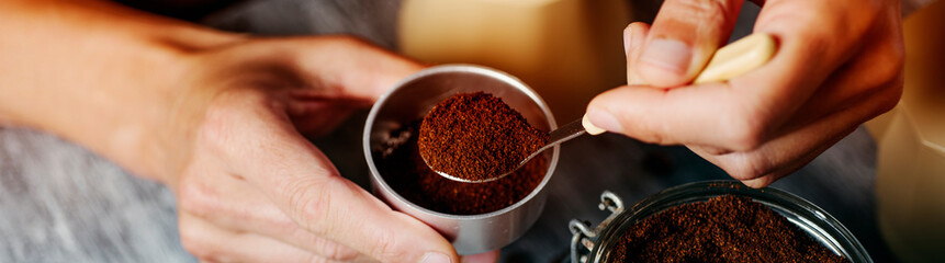 man prepares coffee in a moka pot, web banner