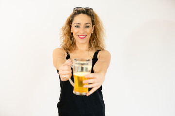 Smiling woman holding beer jar isolated over white background.