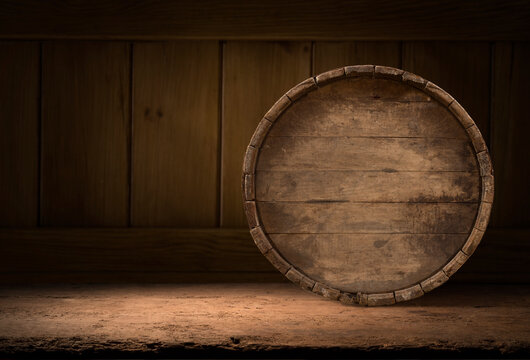 A wine cellar full of barrels of wine