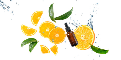Dark brown glass bottle of face serum with vitamin C or essential  oil and orange fruit  slices with leaves in splashing water
