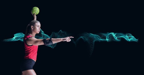 Composition of caucasian female handball player holding ball with copy space on black background - Powered by Adobe
