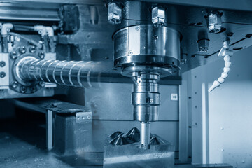 The abstract scene of CNC milling machine and ball screw parts. The mold and die manufacturing...